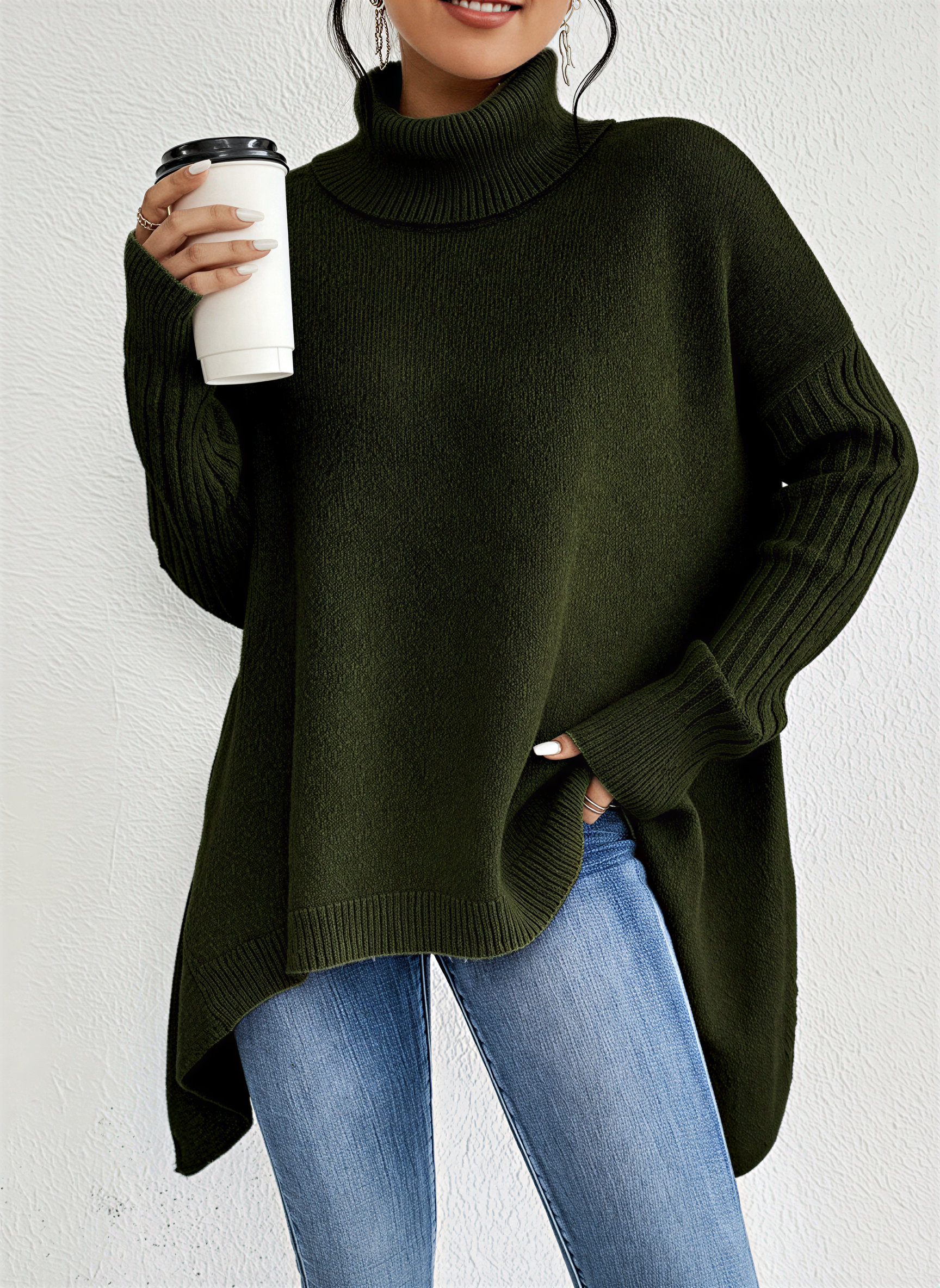 Jesie-London Alice women's oversized turtleneck sweater with a front pocket, in soft knit fabric, shown in a cozy, relaxed fit.