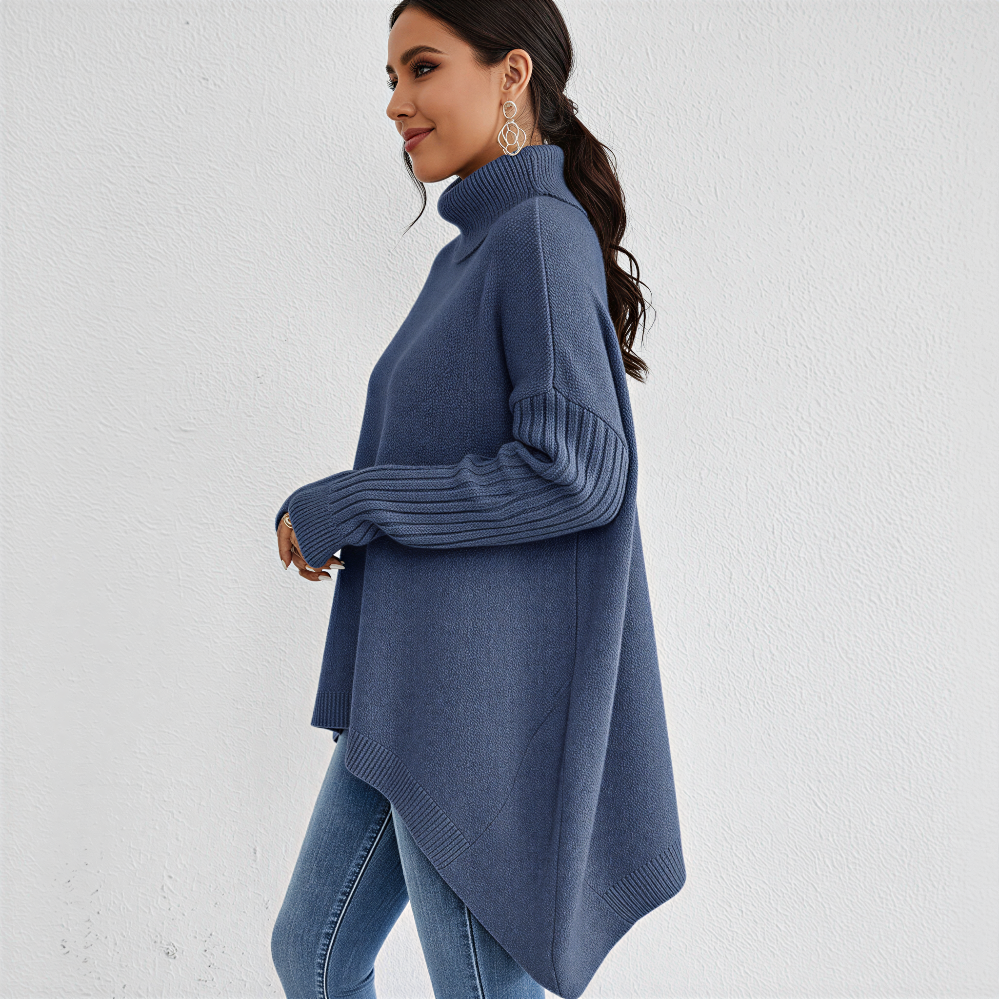 Jesie-London Alice women's oversized turtleneck sweater with front pocket, in a cozy knit fabric, shown in a neutral color.