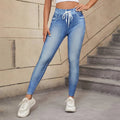 Women’s high waisted denim-print leggings by Jesie-London, featuring a close-up of the denim-inspired pattern and pull-on style.