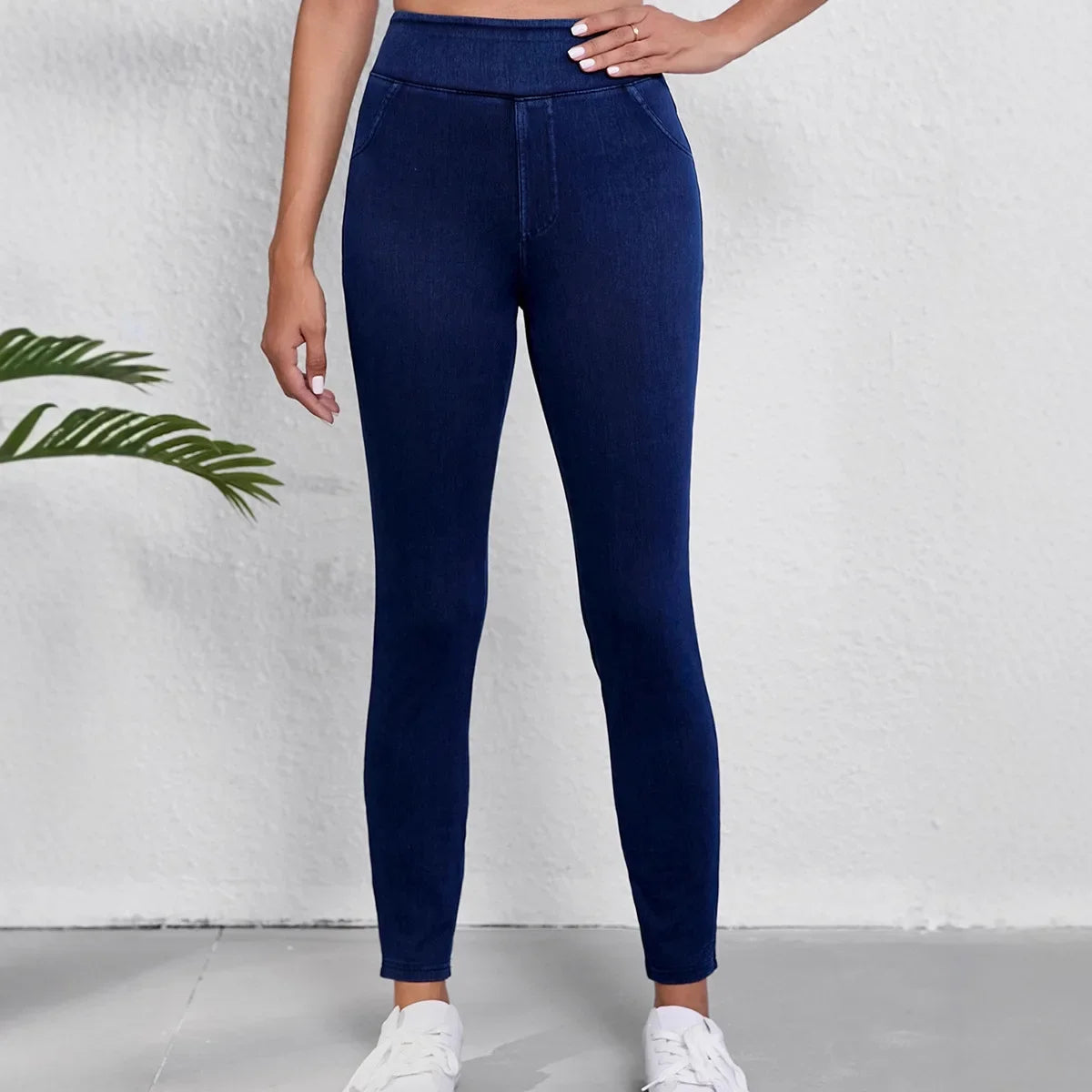 Women’s high-rise slim fit stretch jeans by Jesie-London, showcasing a stylish dark wash and fitted silhouette.