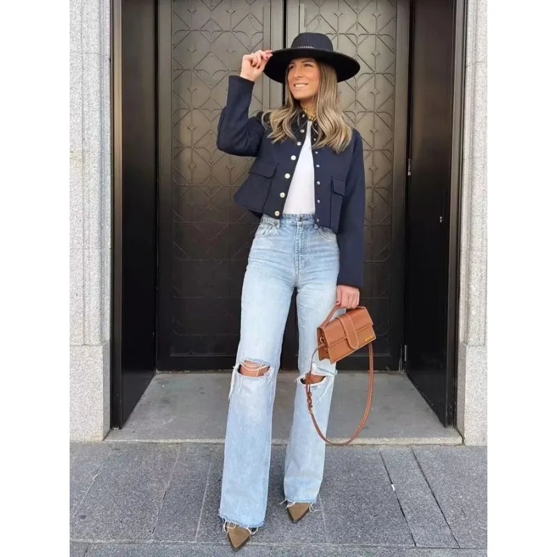 Women's cropped button front bomber jacket by Jesie-London, shown in a stylish, fitted design with front buttons and cropped length.