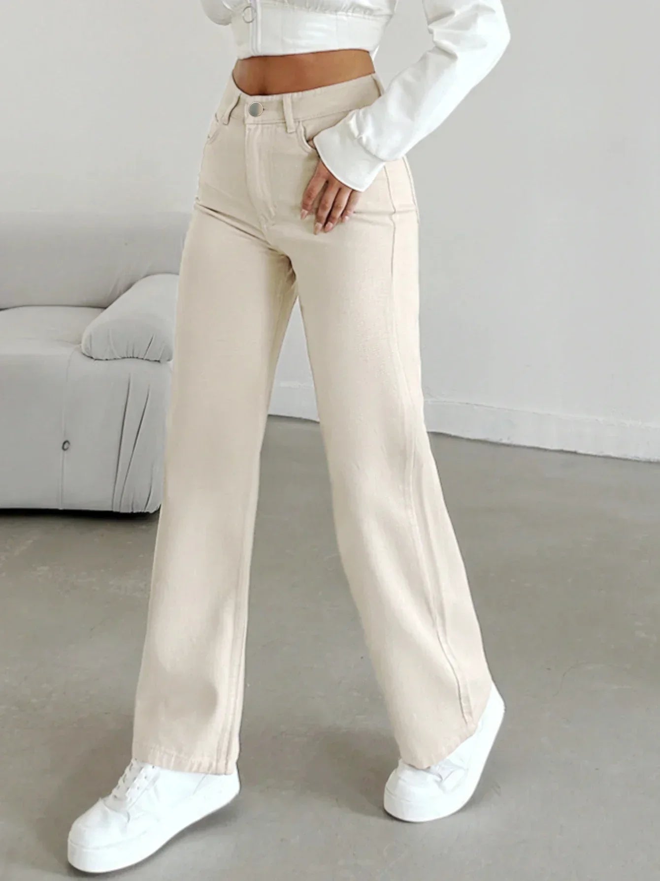 Women's high waist straight leg denim jeans in a loose fit, by Jesie-London, shown in a casual front view.