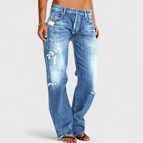 Ava women's distressed low-rise straight leg denim jeans by Jesie-London, loose-fit mid-rise style, shown on a model.