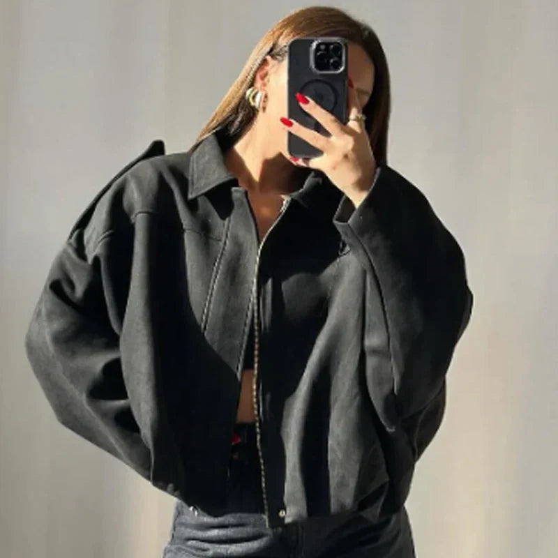 Women's cropped zip-up bomber jacket by Jesie-London, oversized fit, front zipper, and stylish design in the image.