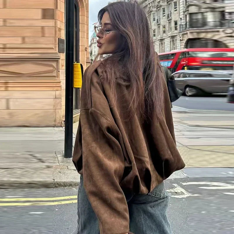 Women's cropped zip-up bomber jacket by Jesie-London, oversized fit with front zipper and stylish design.