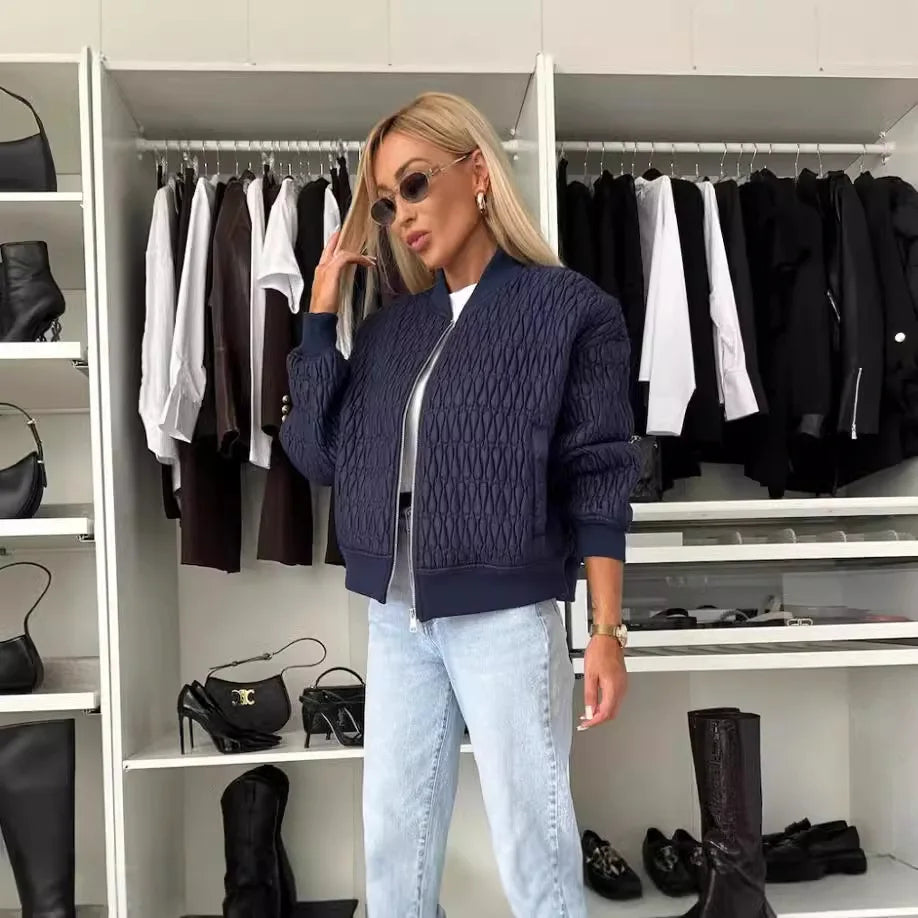 Jesie-London Isabella women's quilted zip-up bomber jacket shown in a close-up, featuring a stylish quilted design and front zipper.