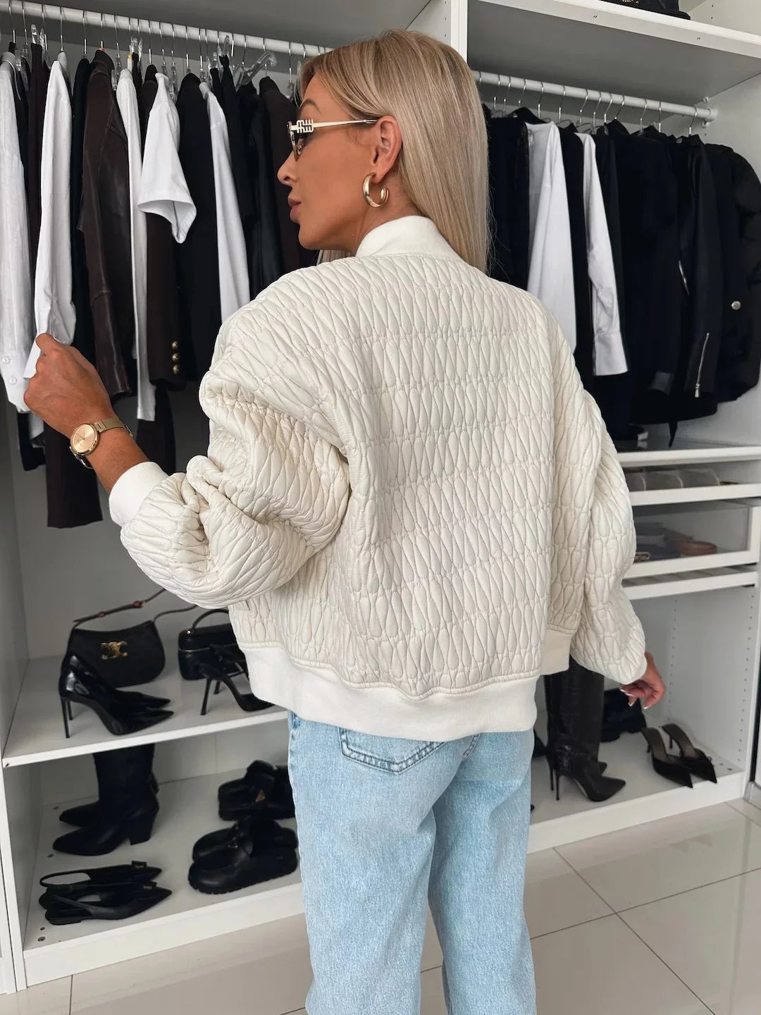 Women's Isabella Jesie-London quilted zip-up bomber jacket with front pockets and a stylish collar, perfect for casual wear.