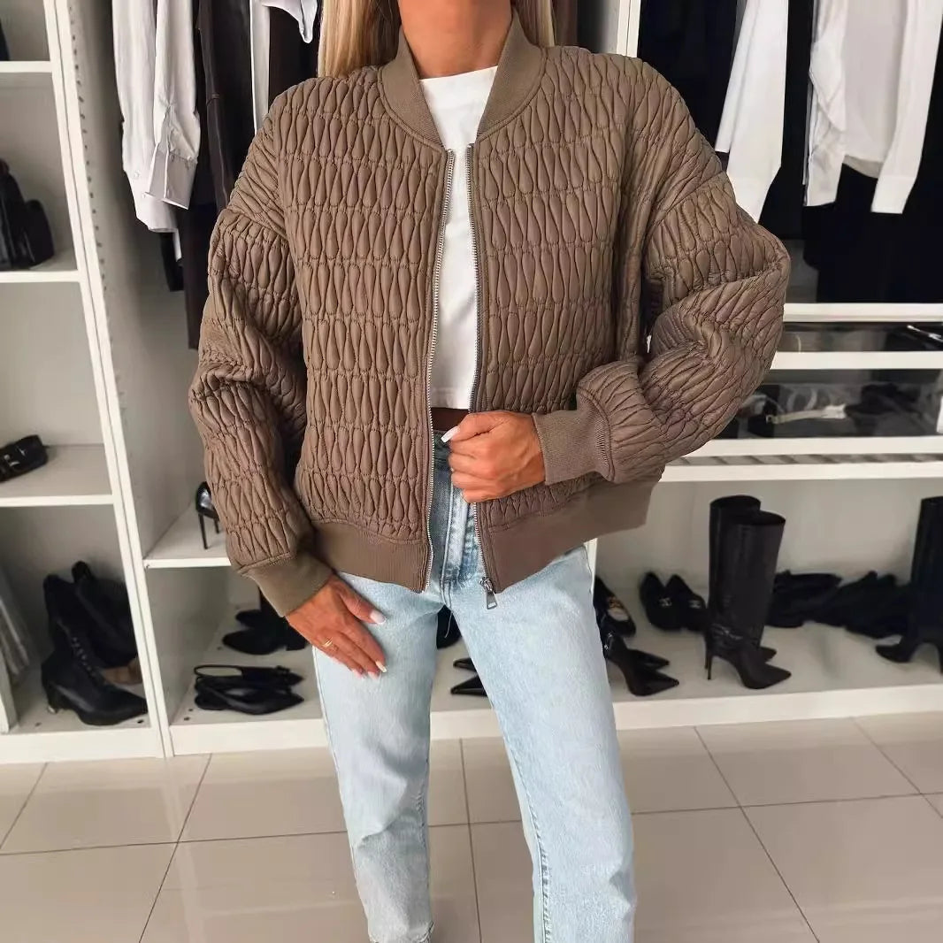 Women's Isabella quilted zip-up bomber jacket by Jesie-London, featuring a stylish quilted design and front zipper closure.