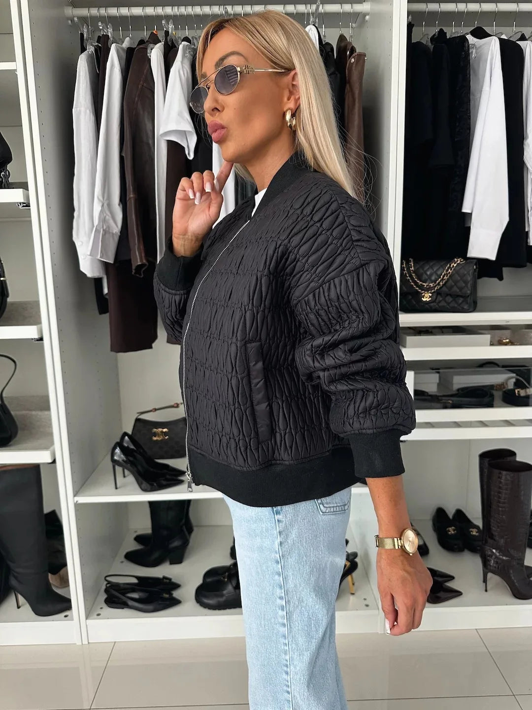 Jesie-London Isabella women's quilted zip-up bomber jacket displayed on a model, showcasing its stylish design and quilted texture.