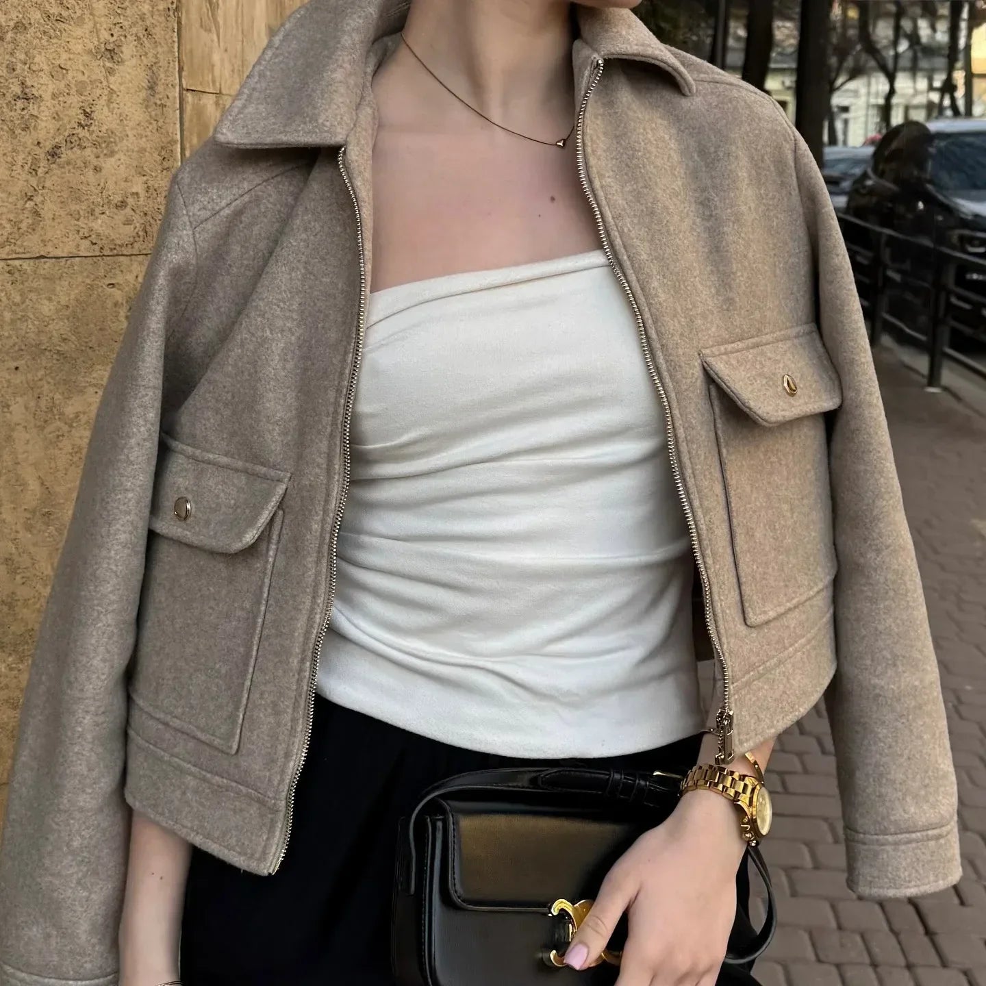 Jesie-London Georgia women's cropped zip-up bomber jacket shown in a front view with a short style and zip closure.
