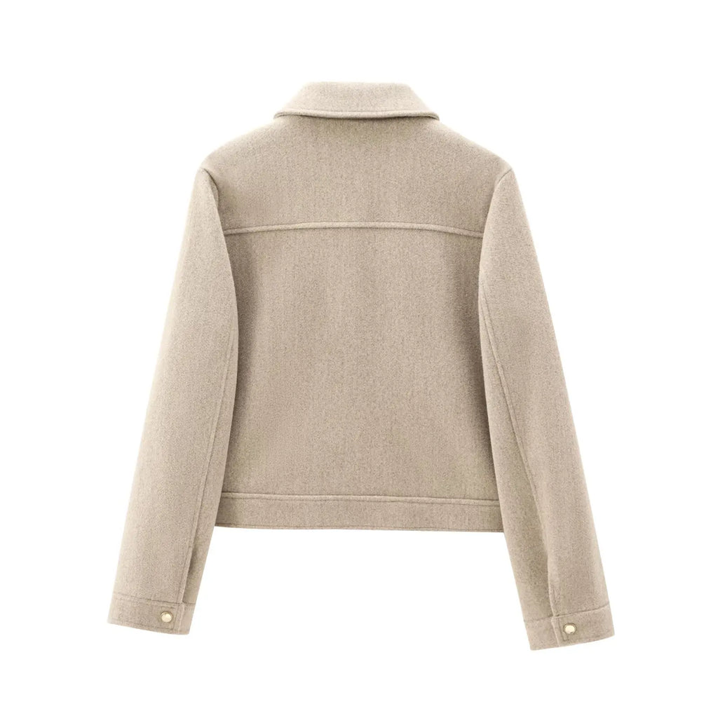 Jesie-London Georgia women's cropped zip-up bomber jacket displayed on a model, showcasing its stylish short front and fitted design.