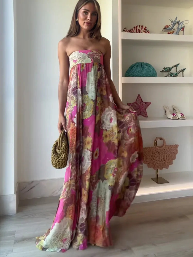 Jesie-London women's strapless floral maxi wedding guest dress with elegant design and vibrant flower pattern.