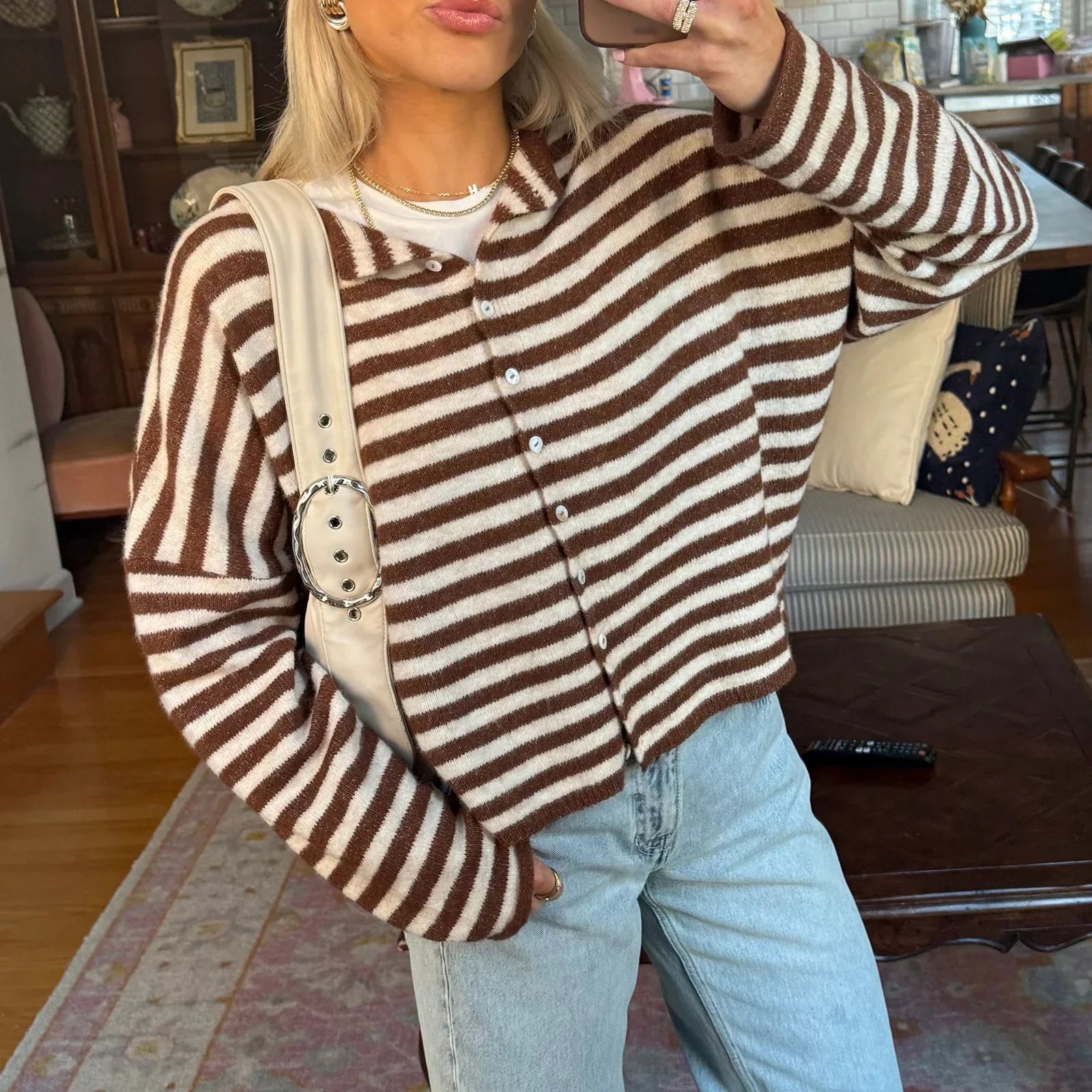 Women's striped button-front cardigan sweater by Jesie-London, featuring a stylish design and classic fit.