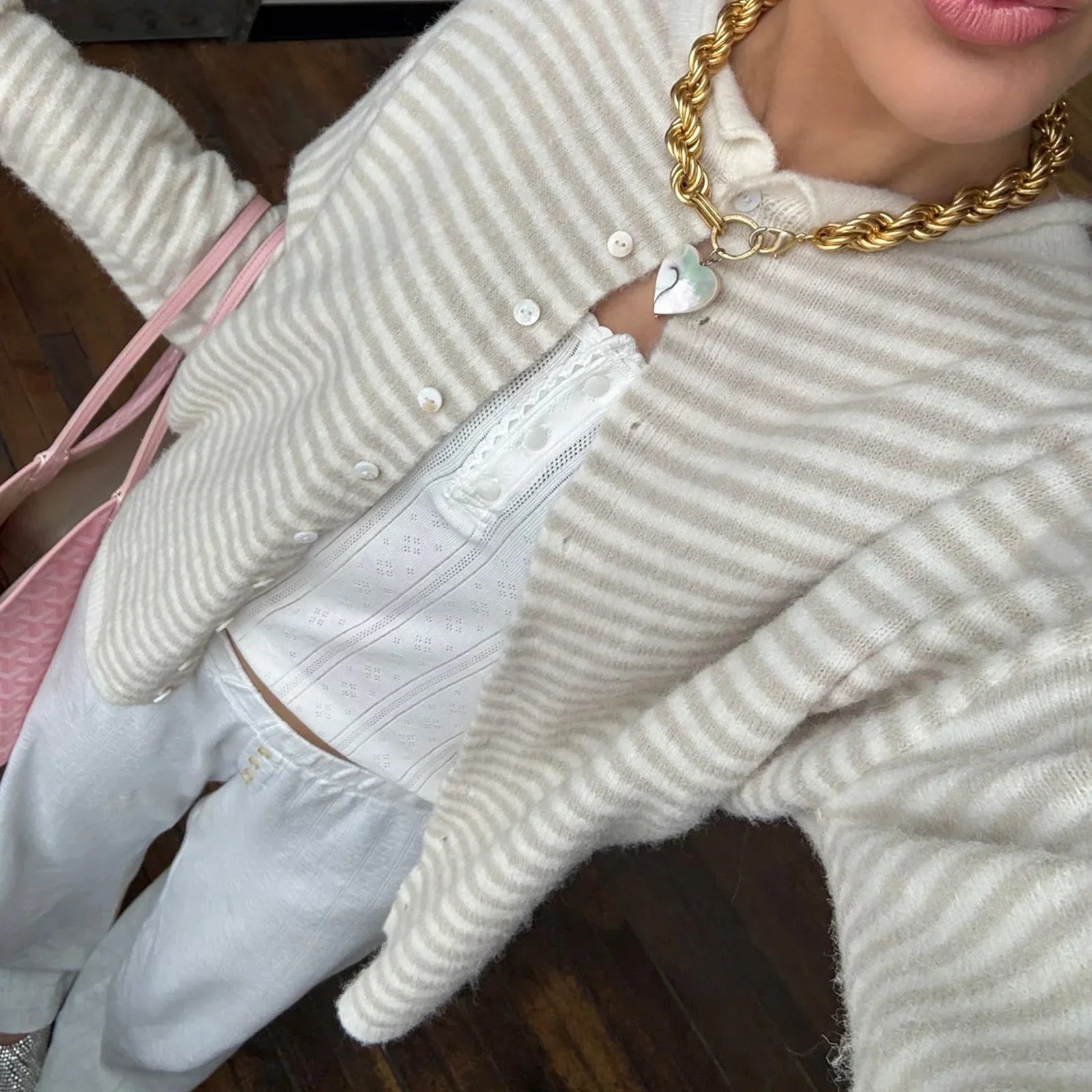 Women's striped button-front cardigan sweater by Jesie-London featuring a classic design and front buttons, perfect for casual wear.
