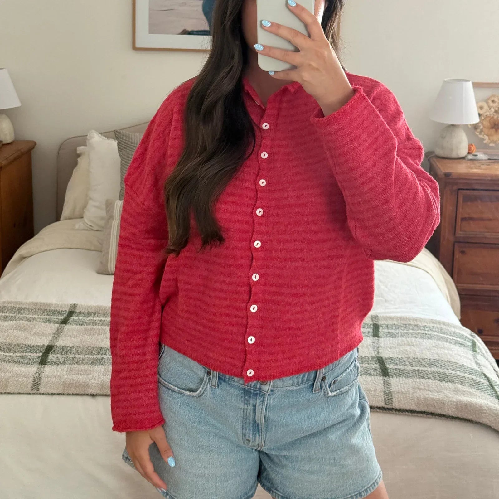 Women's striped button-front cardigan sweater by Jesie-London featuring a classic knit design and front button closure.