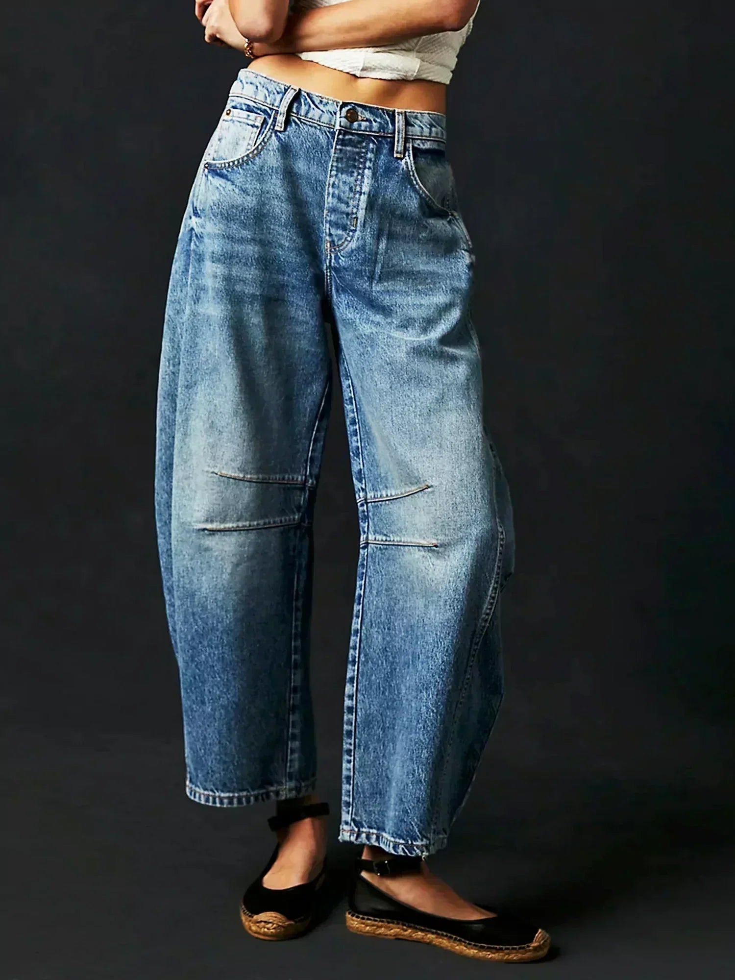 Women’s leopard print wide leg jeans by Jesie-London featuring high waist and relaxed fit, shown in a stylish denim design.