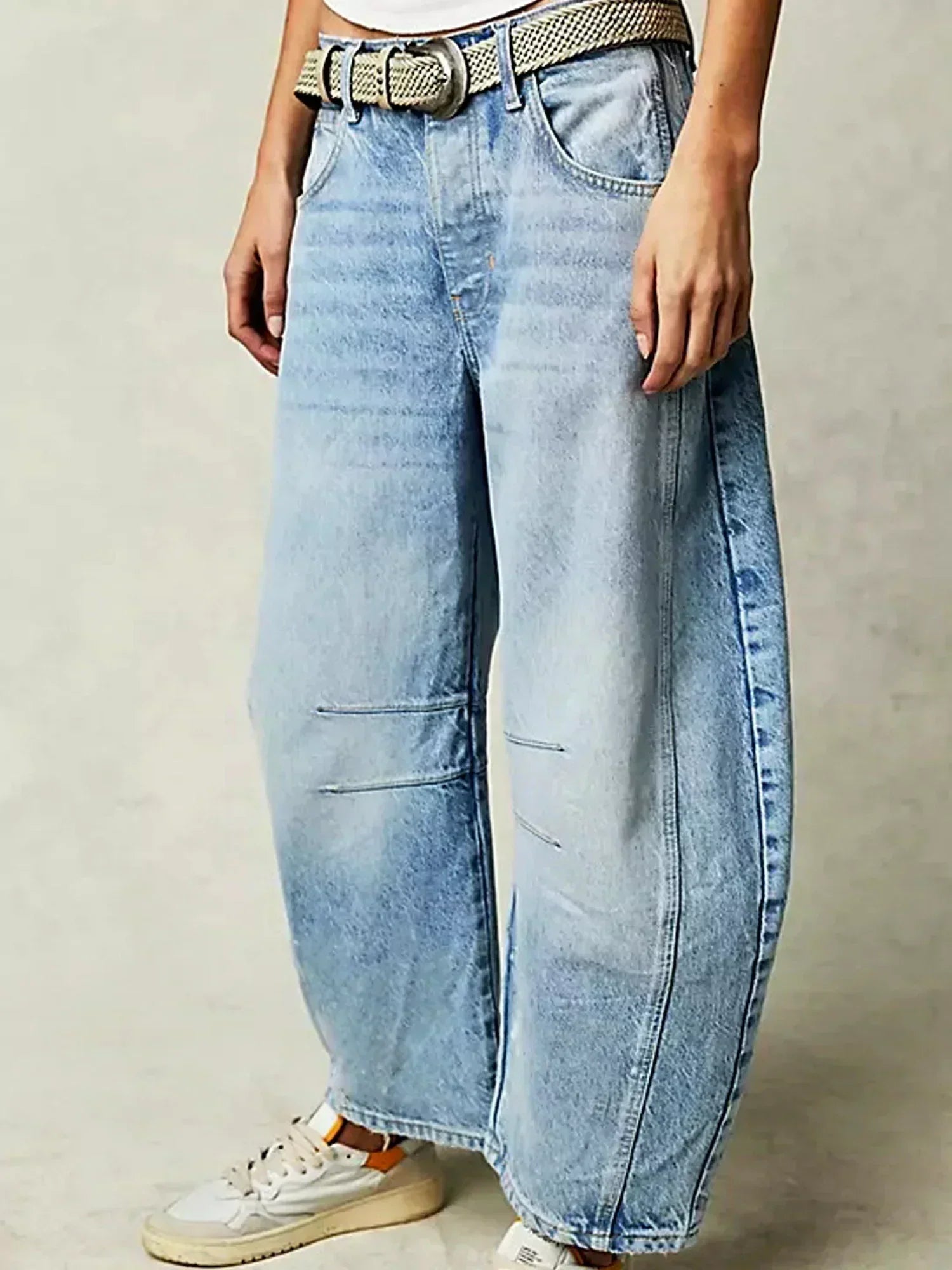 Women’s leopard print wide-leg high-waisted denim jeans by Jesie-London, showcasing the stylish, relaxed fit with bold animal print pattern.
