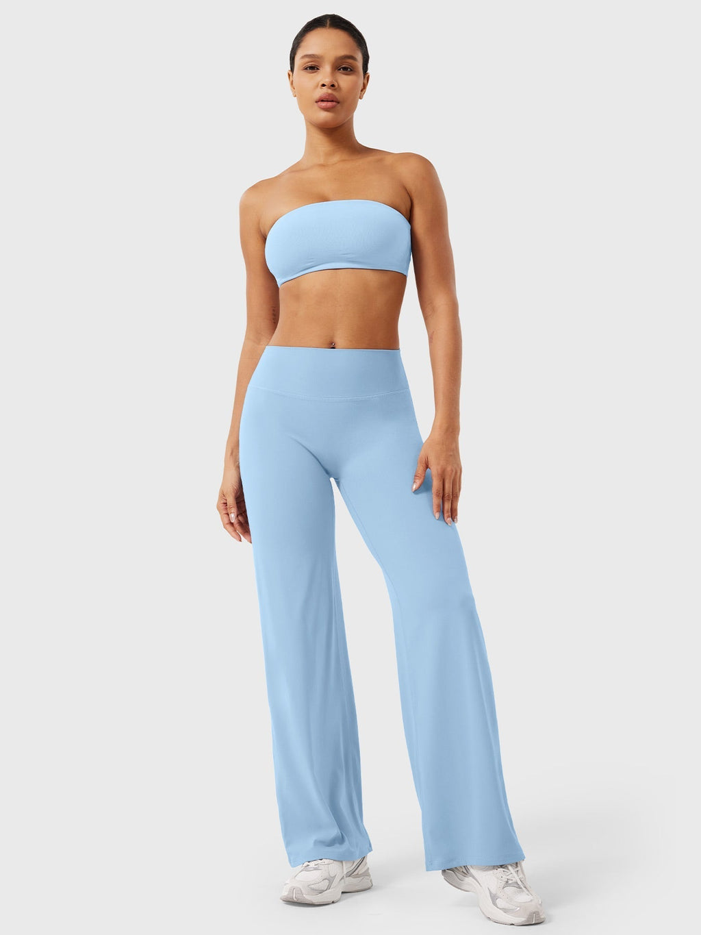 Air blue women's high waist flared pants from Jesie-London's Millie summer collection, showcasing a stylish, flowy silhouette.