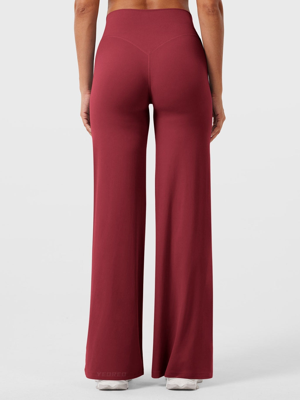 Red high waist flared pants for women by Jesie-London, featuring a summer design and stylish fit.