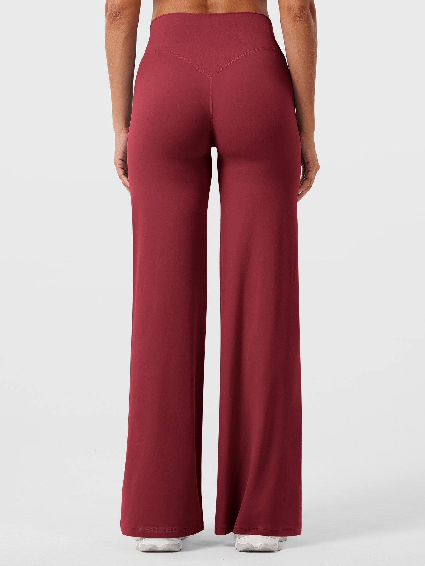 Red high waist flared pants for women by Jesie-London, featuring a summer design and stylish fit.