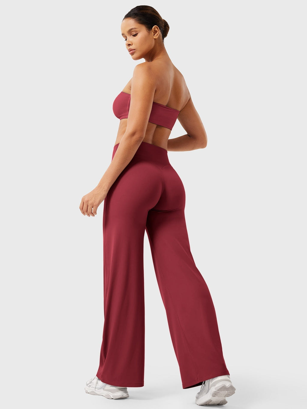 Women’s high waist flared pants by Jesie-London in Anchor Red, with a summer-ready, flowy silhouette and wide-leg style.