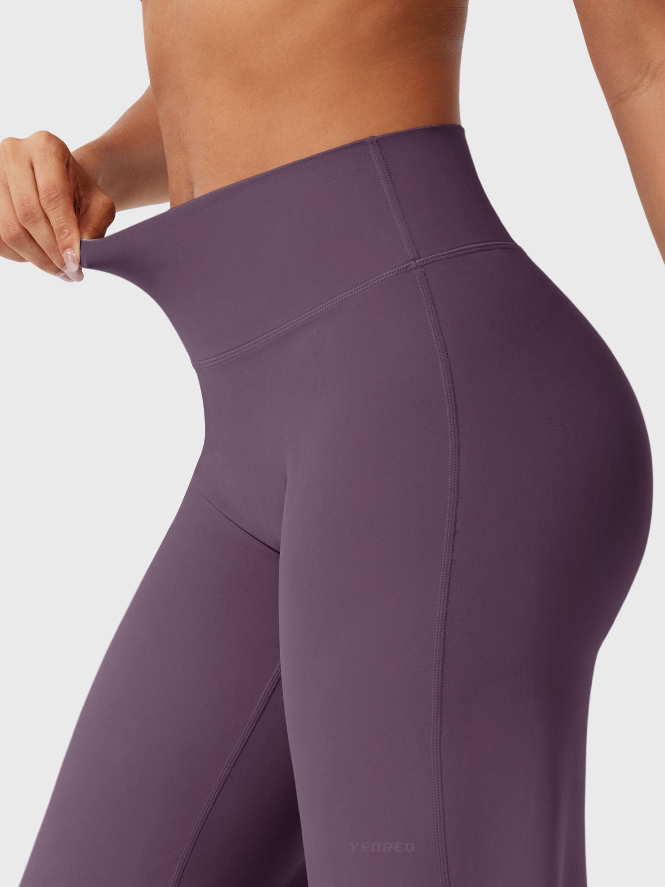 Blackberry purple women's high waist flared pants from Jesie-London, stylish summer women’s trousers with a flattering fit.