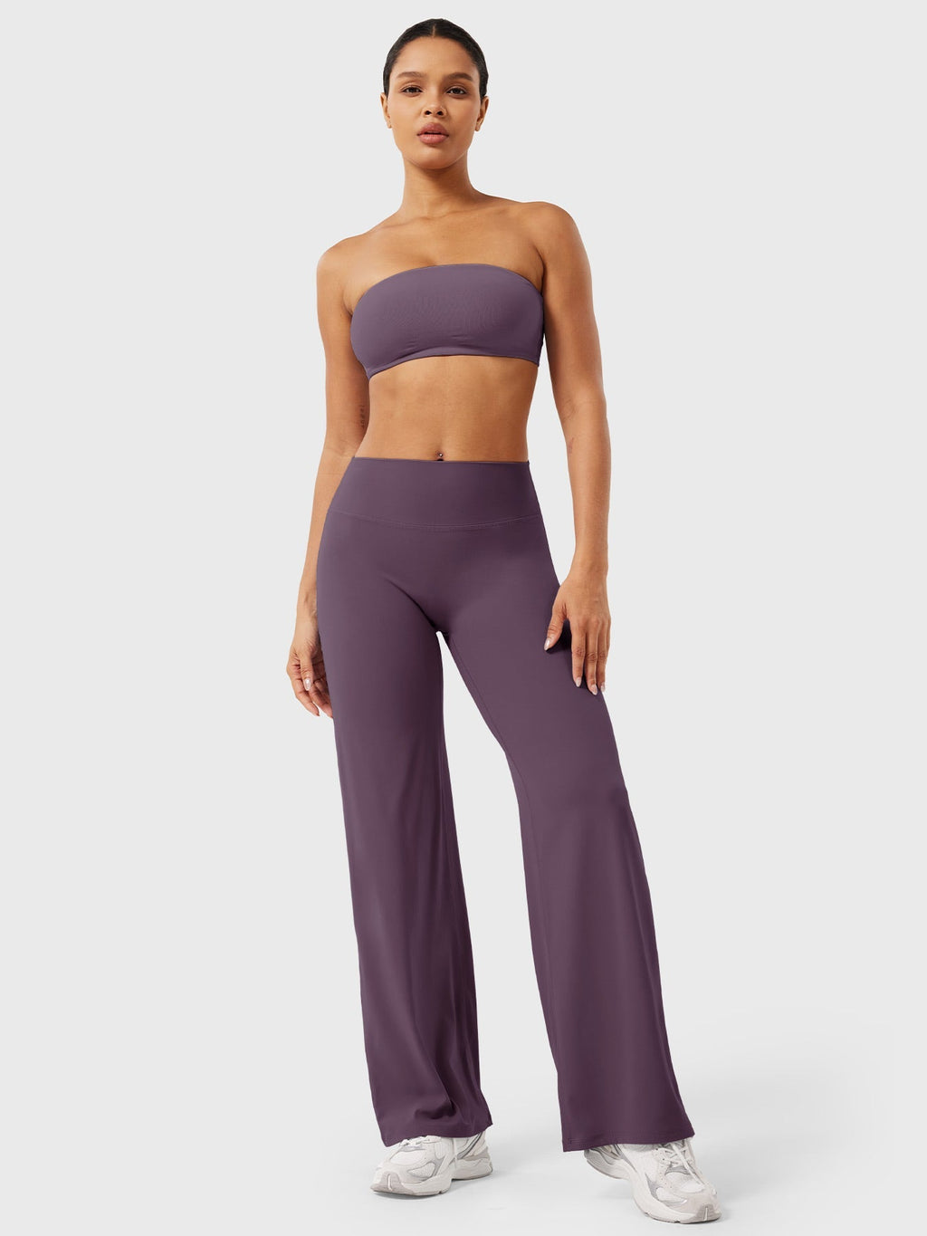 Blackberry purple high waist flared summer pants for women by Jesie-London, styled with a relaxed fit and wide leg design.