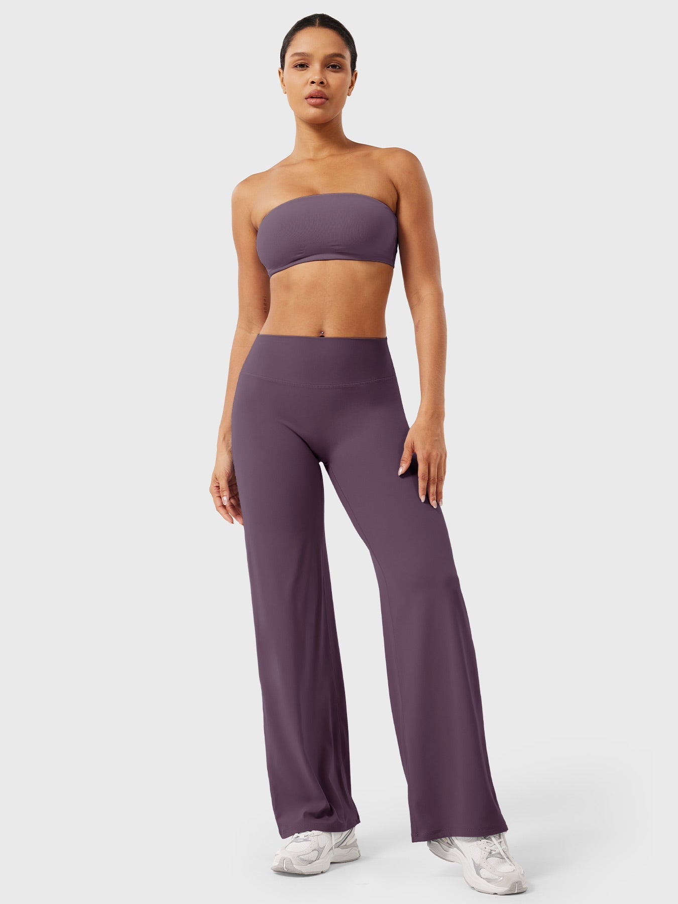 Blackberry purple high waist flared summer pants for women by Jesie-London, styled with a relaxed fit and wide leg design.