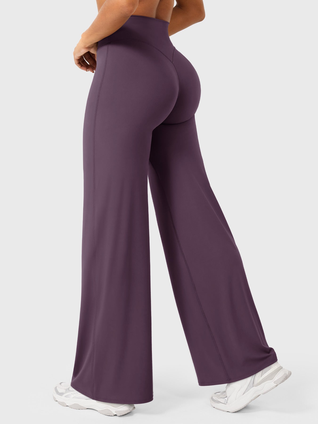 Blackberry purple high-waist flared pants for women by Jesie-London, featuring a summer-friendly, stylish fit and flared silhouette.