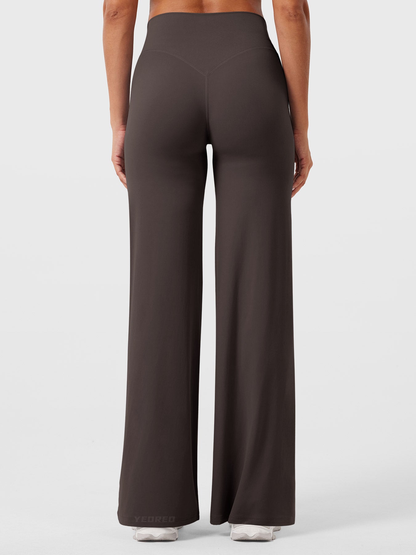 Dark brown women's high waist flared pants from Jesie-London's Millie summer collection, showcasing a relaxed fit and stylish design.