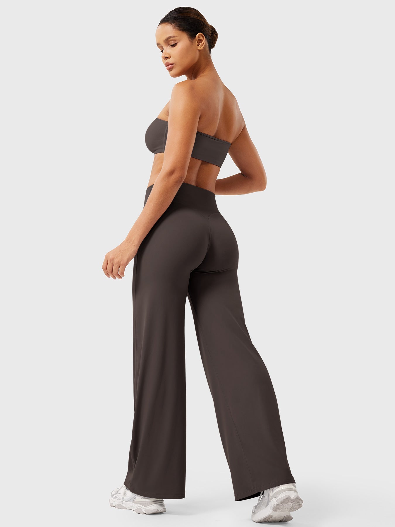Dark brown Millie women's summer high waist flared pants by Jesie-London, showcased on a model against a neutral background.