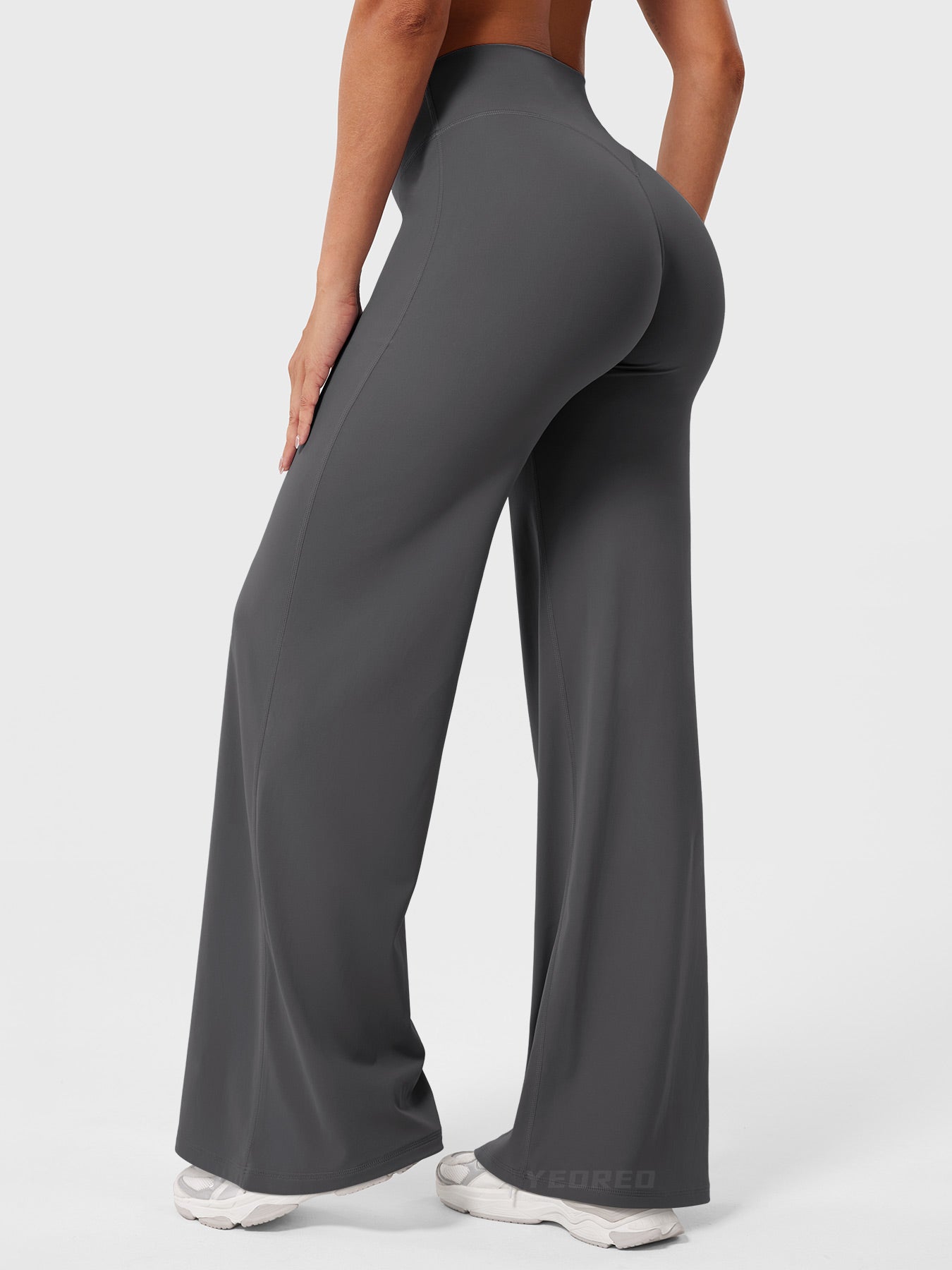 Dark grey women's high waist flared pants by Jesie-London, styled for summer, featuring a flattering fit and comfortable fabric.