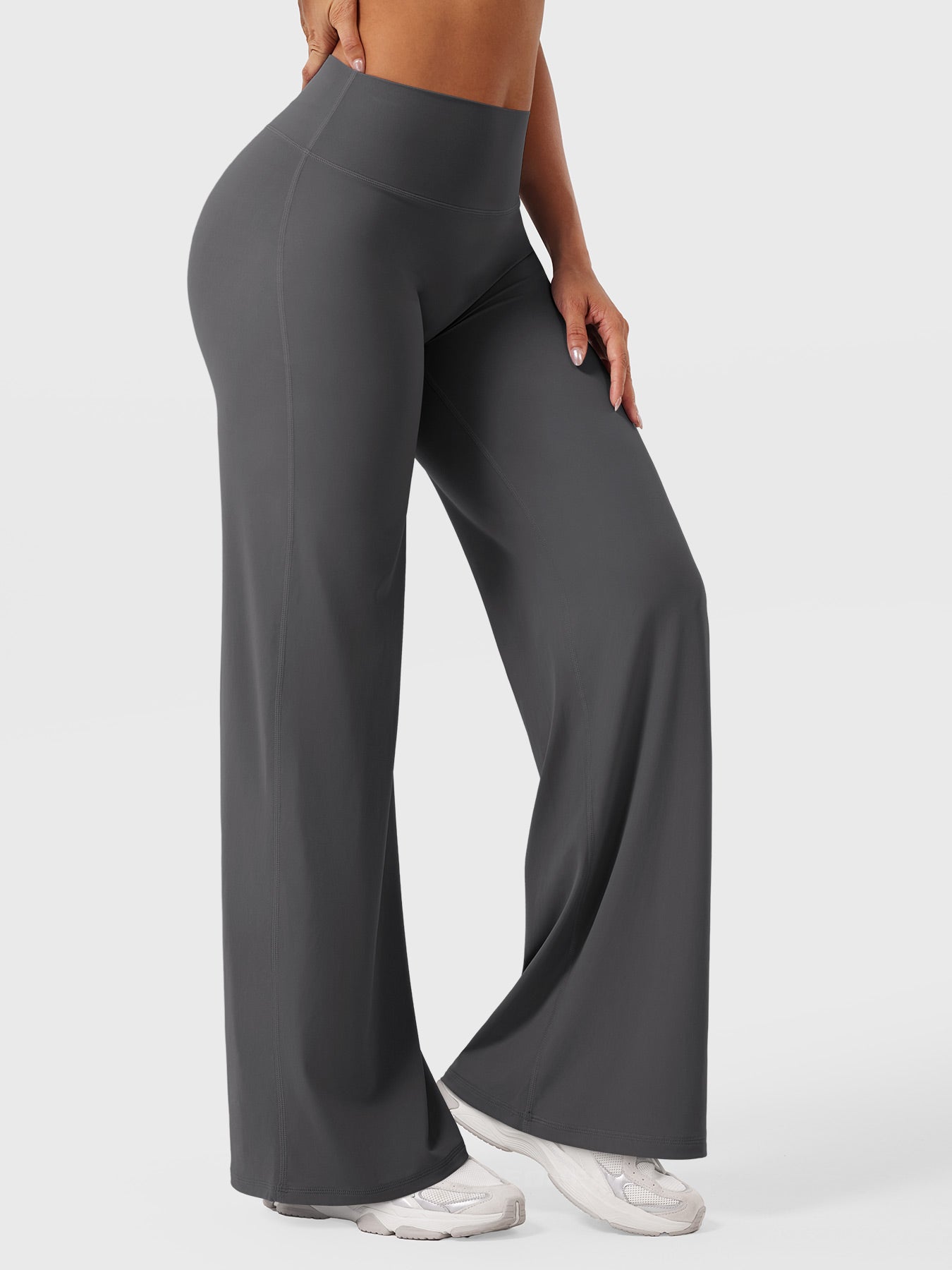 Dark grey women's high waist flared pants from Jesie-London's Millie summer collection, shown on a model.