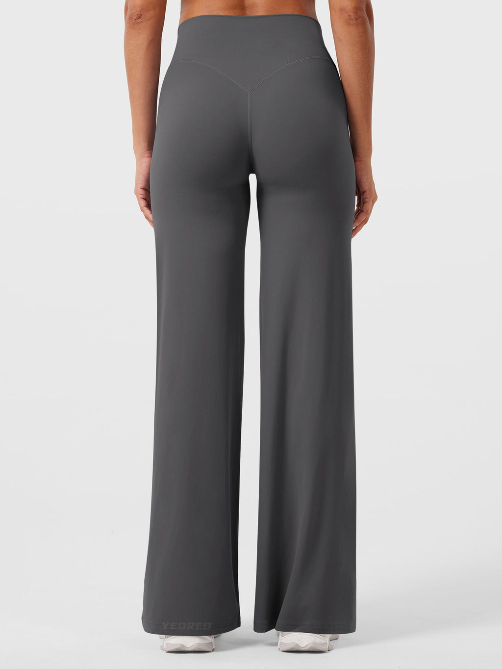 Dark grey women's high waist flared pants from Jesie-London's Millie summer collection, shown on a model.