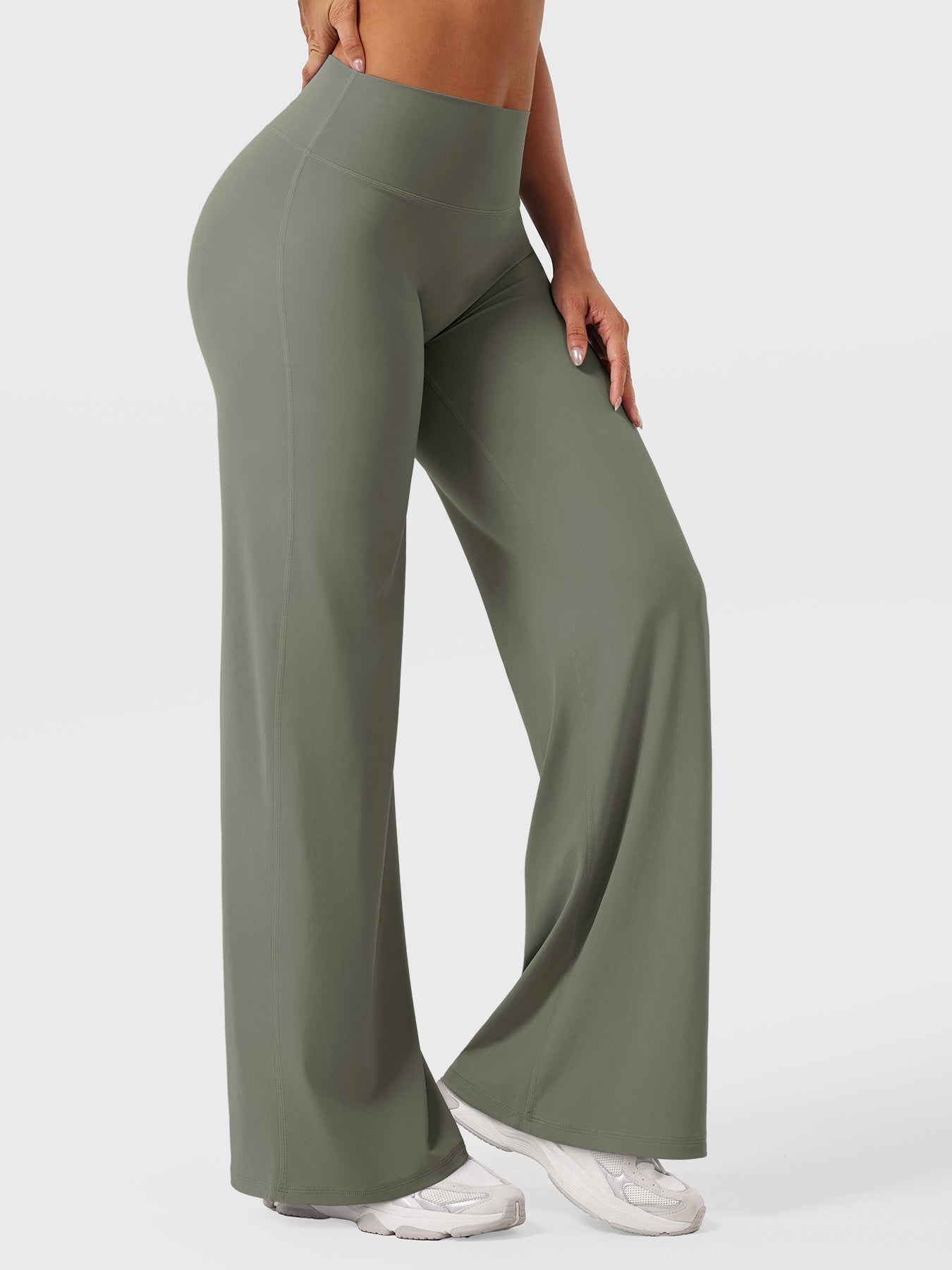 Millie women's high waist flared pants in grey-green by Jesie-London, shown in a stylish summer outfit.