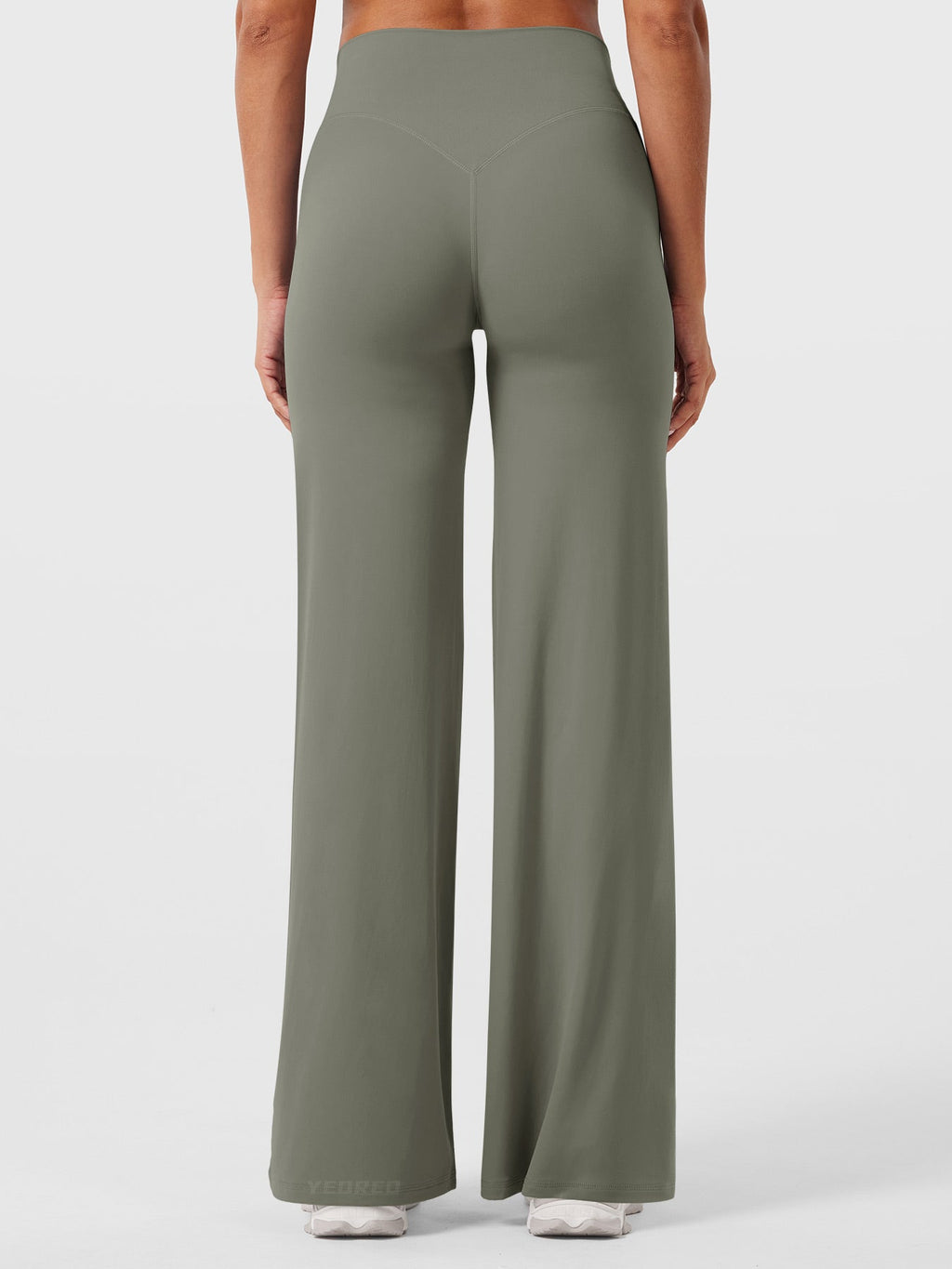 Grey-green women's high waist flared pants by Jesie-London, styled for summer wear, with a comfortable fit and flowy silhouette.