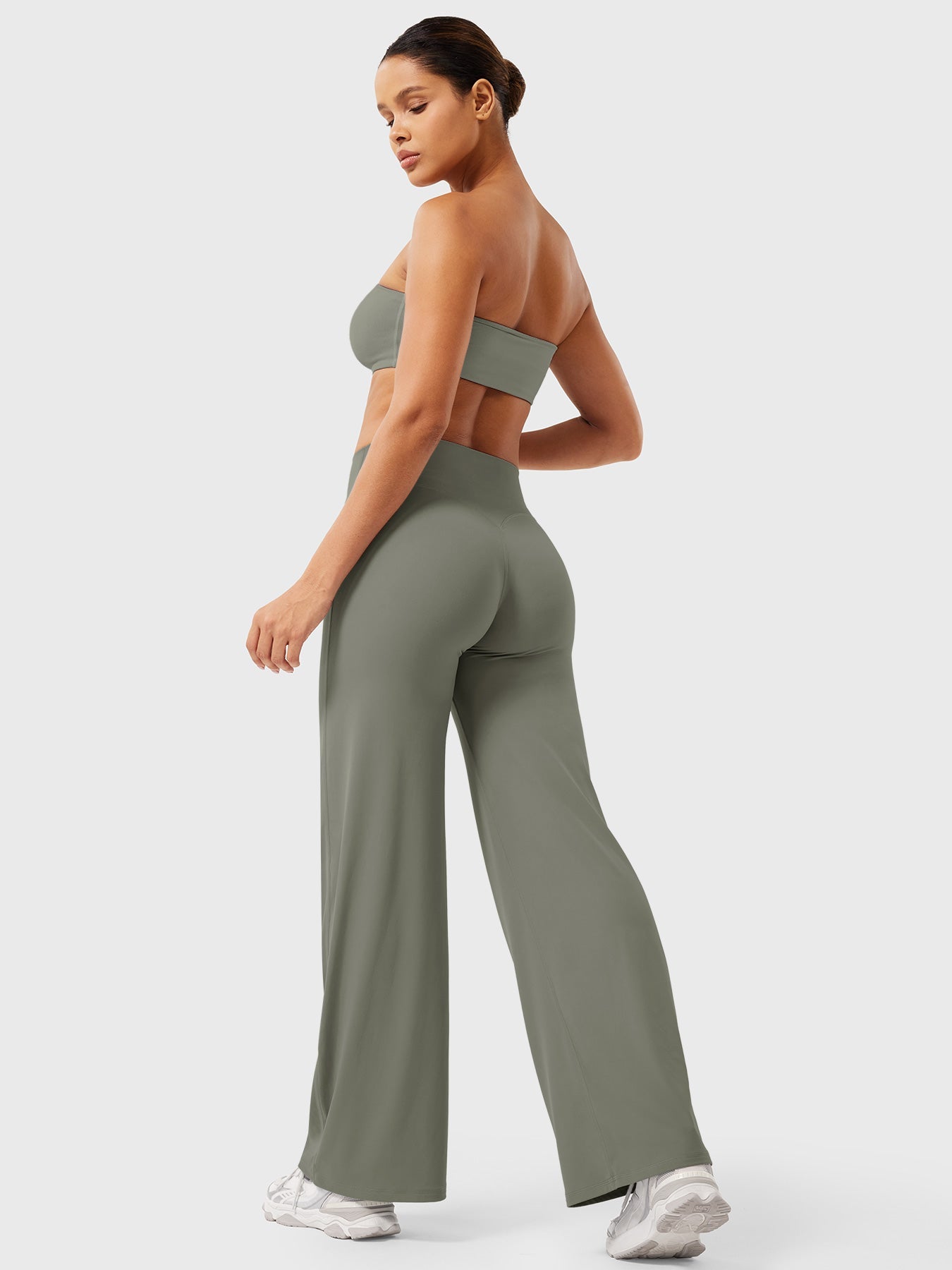 Grey-green high waist flared pants for women by Jesie-London, showcasing the stylish summer design and fit.