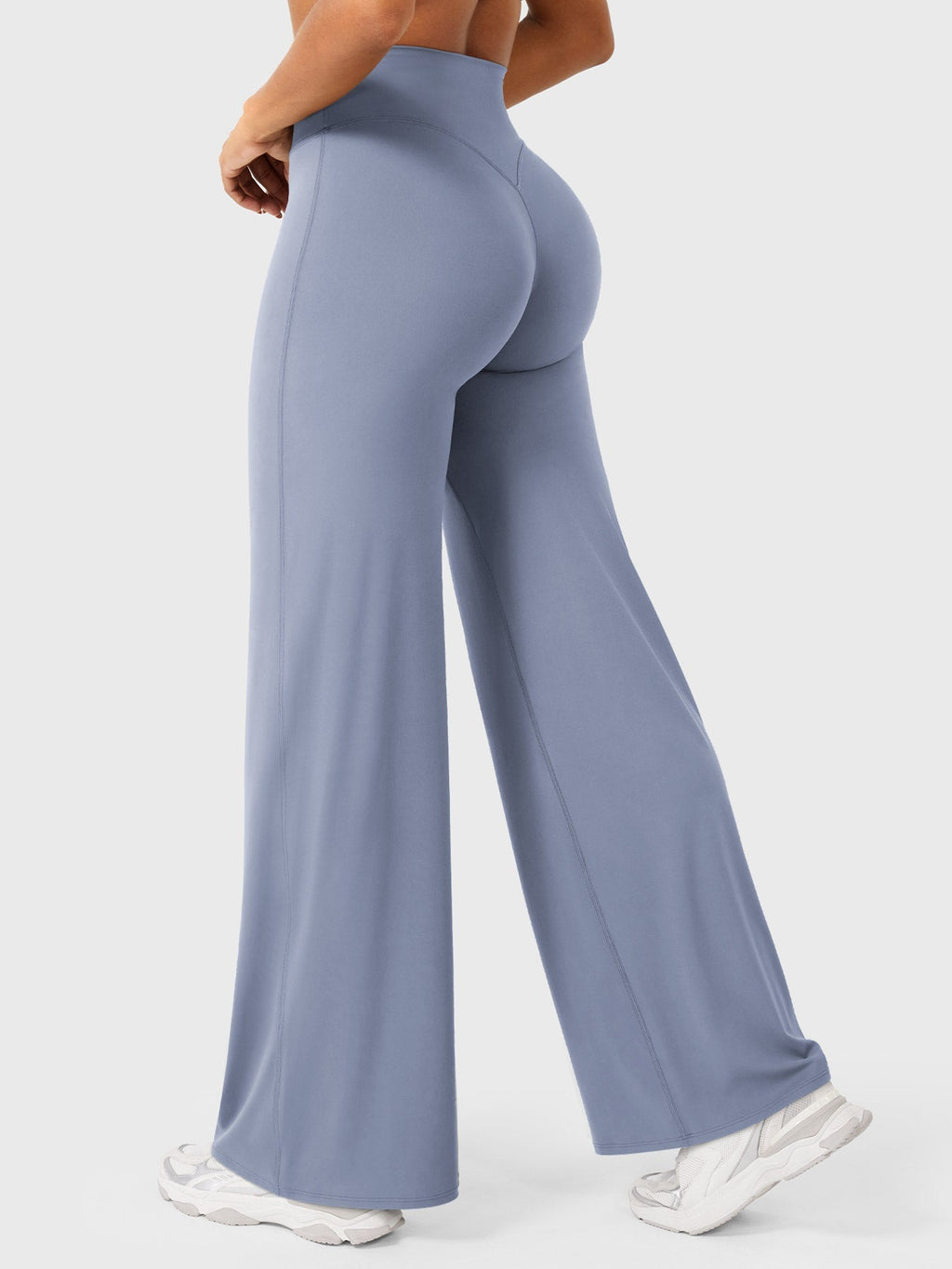 Millie women's summer high waist flared pants in haze blue by Jesie-London, showcasing the stylish high waist and flared design.