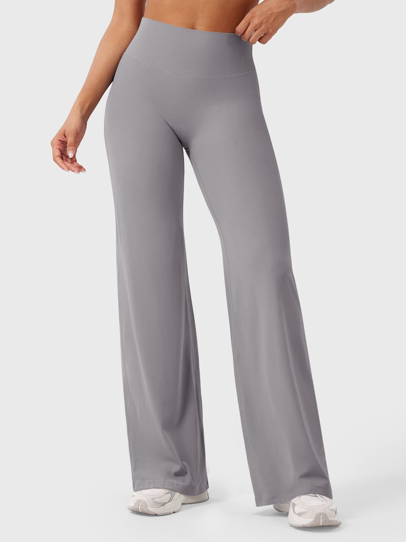 Light grey women's high waist flared pants from Jesie-London's Millie summer collection, shown on a model.