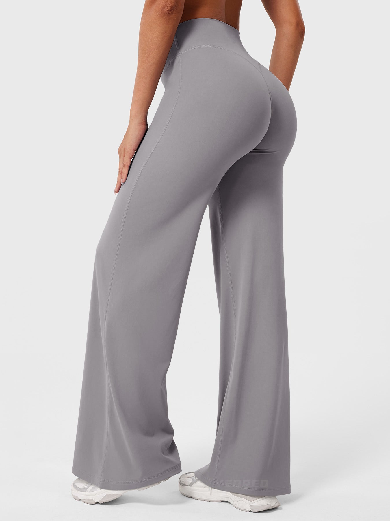 Light grey women's high waist flared summer pants by Jesie-London, featuring a stylish, flowing design and comfortable fit.