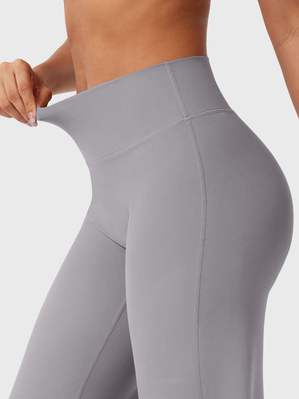 Light grey Millie women's high waist flared pants by Jesie-London, shown on a model, perfect for summer casual wear.