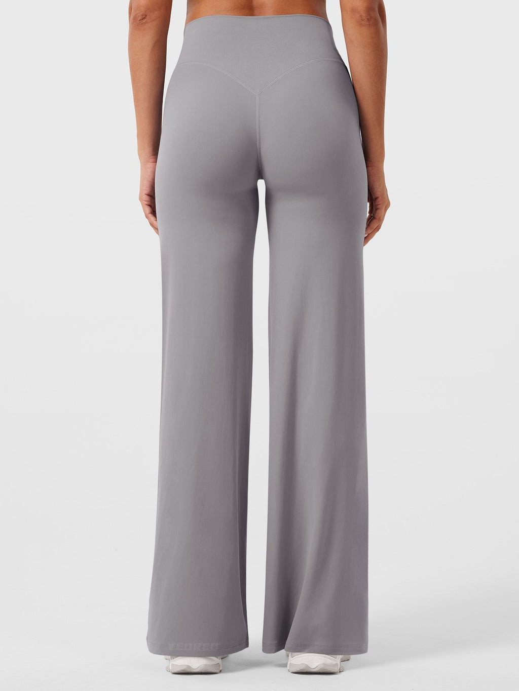 Light grey women's high waist flared pants from Jesie-London's Millie summer collection, shown on a model.