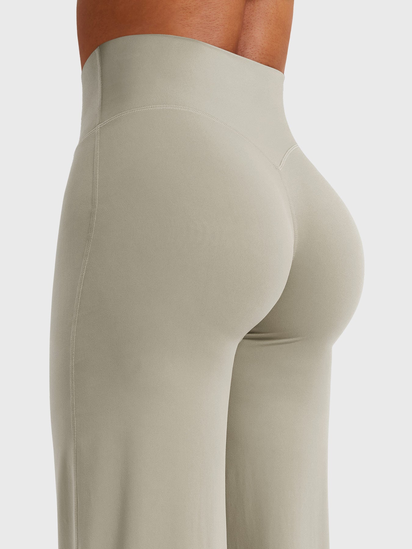 Light sand-colored Jesie-London Millie women’s summer high waist flared pants laid flat on a white surface.