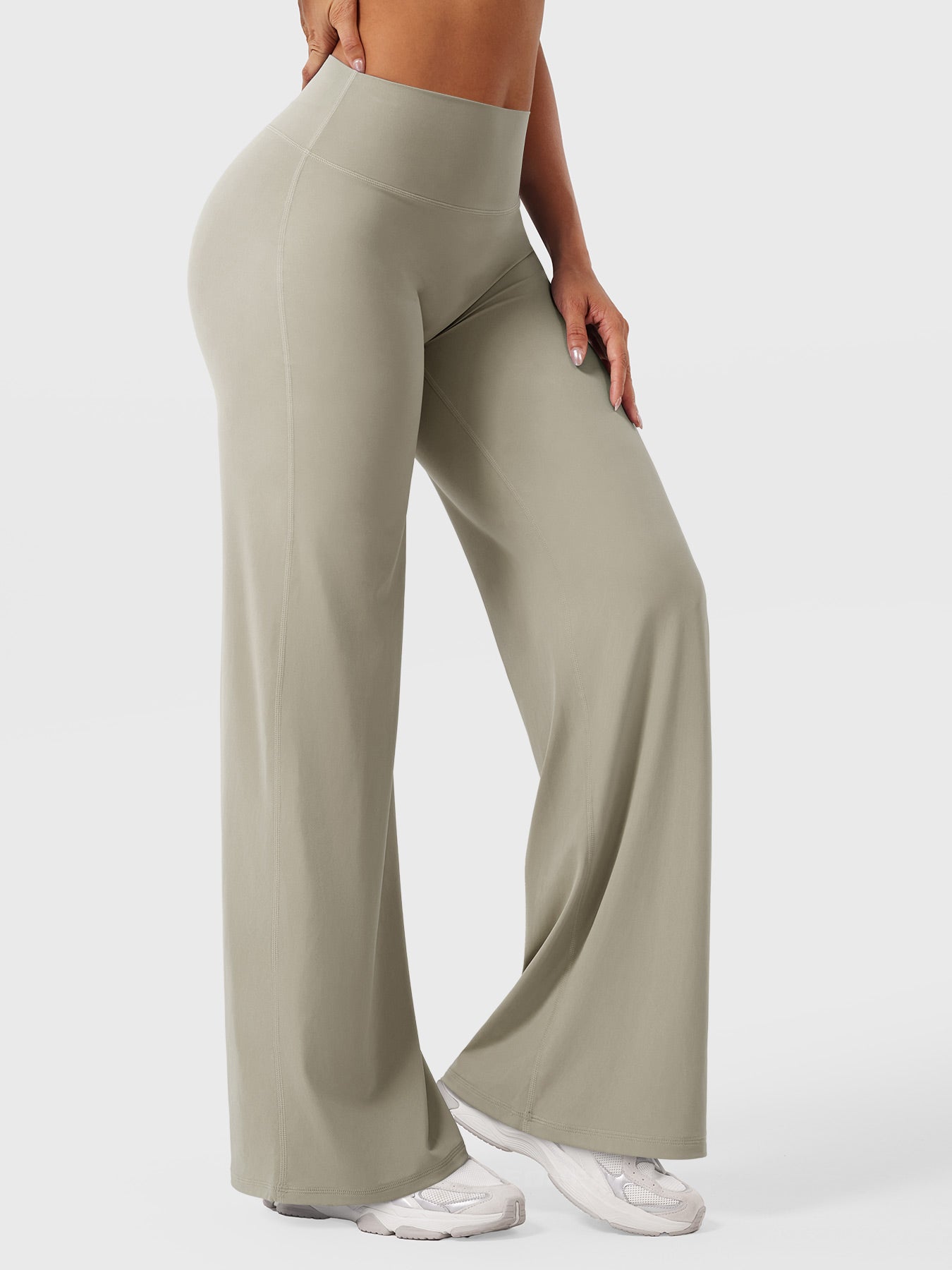 Light sand high waist flared women's summer pants from Jesie-London, featuring a fitted waist and flowing leg design.