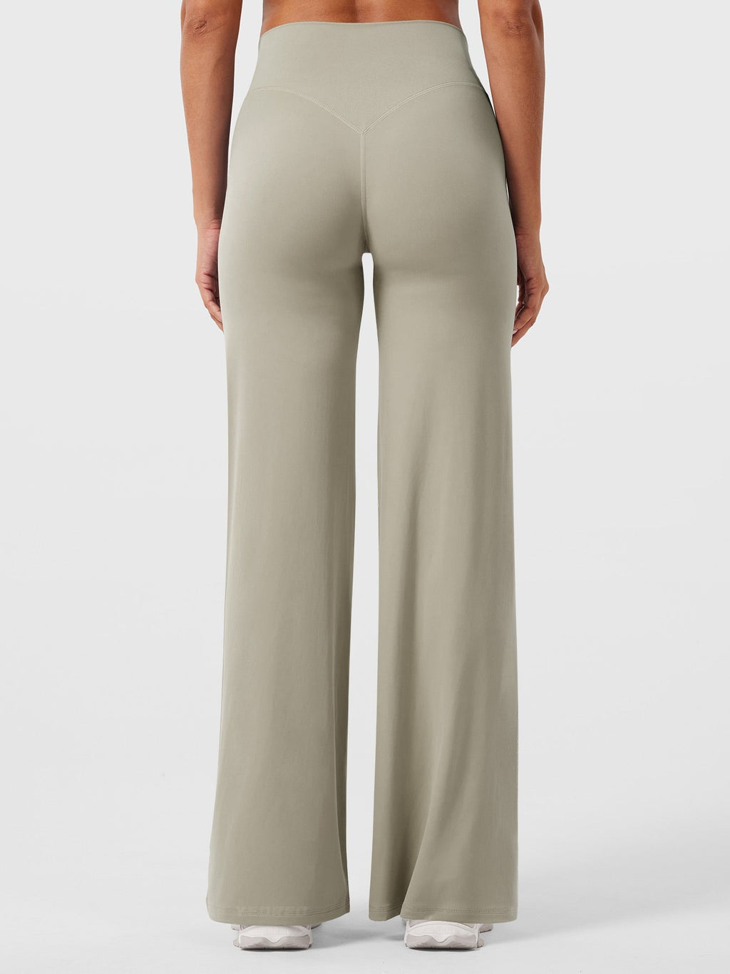 Light sand-colored women's high waist flared pants by Jesie-London, featuring a relaxed fit and summer-ready style.