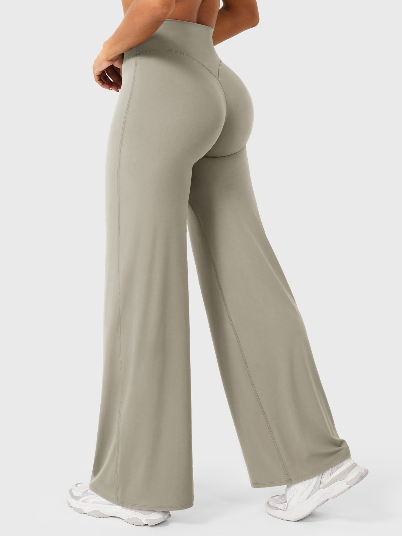 Light Sand high waist flared pants for women by Jesie-London, featuring a summer-friendly, stylish flared silhouette.