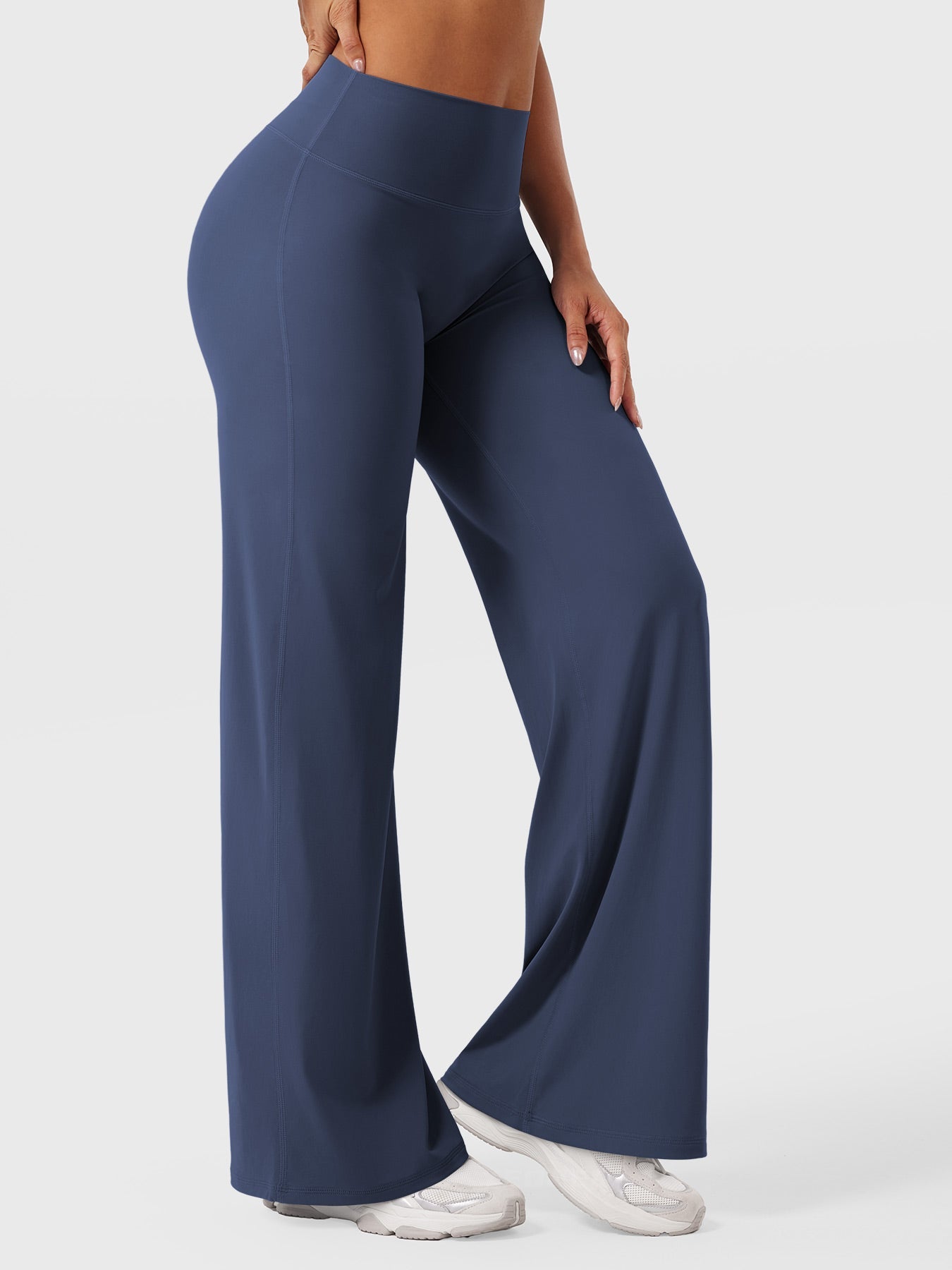 Navy blue women's high waist flared pants from Jesie-London's Millie summer collection, shown on a model.