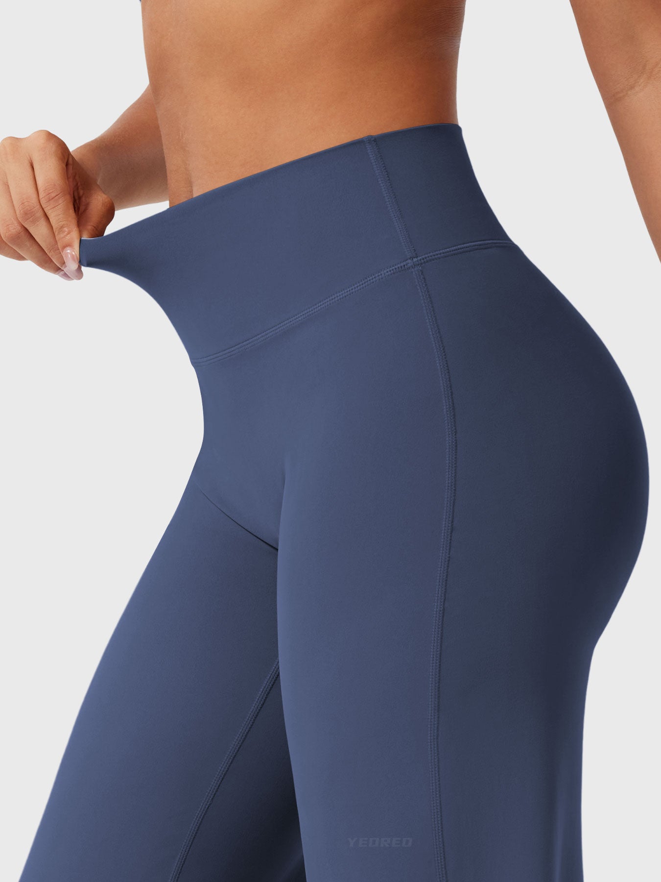 Navy blue women's high-waist flared summer pants by Jesie-London, featuring a stylish, flowy design and comfortable fit.