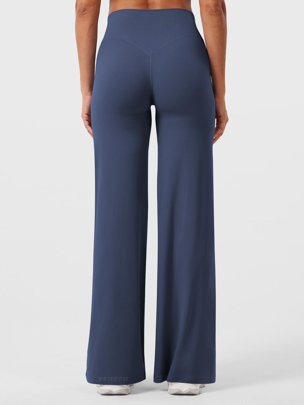 Navy blue high waist flared pants for women by Jesie-London, featuring a summer style with a fitted waist and wide leg silhouette.
