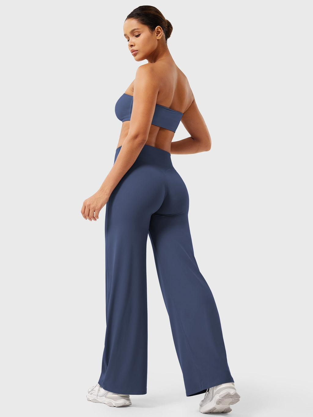 Millie women's navy blue high waist flared pants by Jesie-London, summer fashion with a stylish high-rise fit and flared leg design.